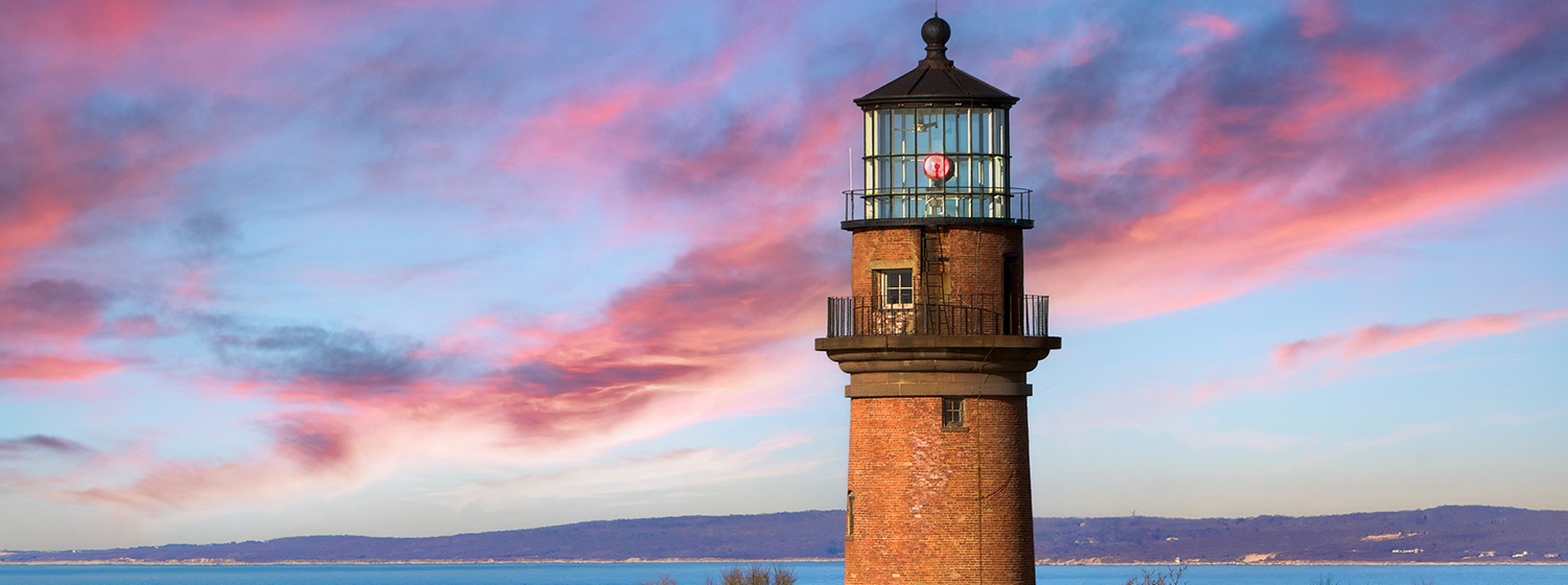 Aquinnah Lighthouse on Martha's Vineyard with colorful clouds